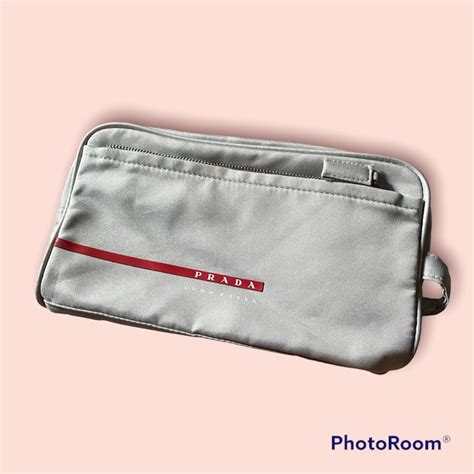 prada clutch bag man|Prada rossa clutch.